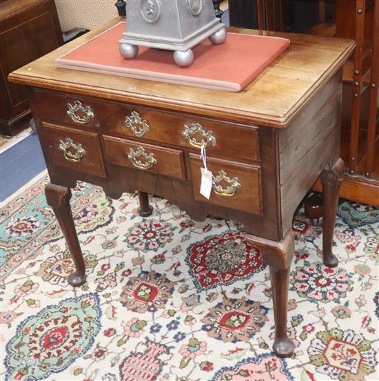 A mid 18th century red walnut lowboy, fitted four drawers W.76cm